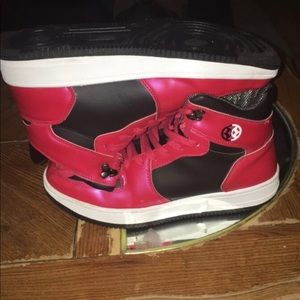 Red and black high top sneakers shoes